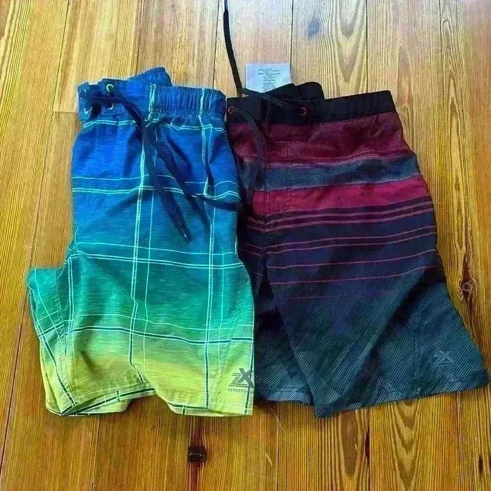 2 Pairs Of Men's Swim Trunks... ZX... ZeroXposur Size Large